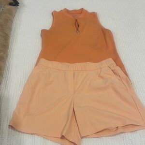 Orange Nike short and polo golf
